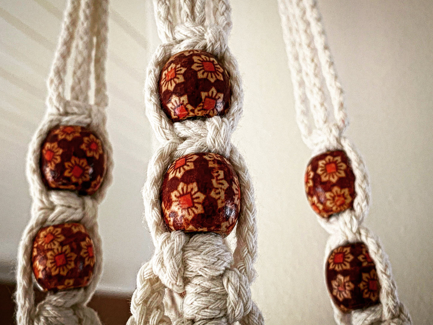 Macramé plant hanger with wooden beads
